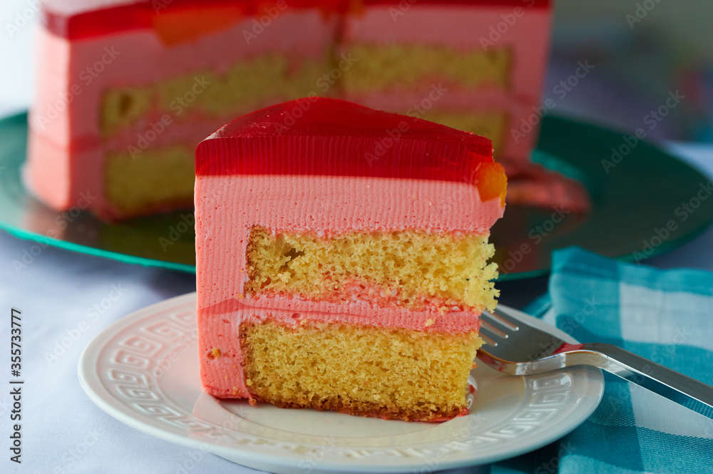 Torta Helada, a Peruvian jello cake with layers of strawberry mousse