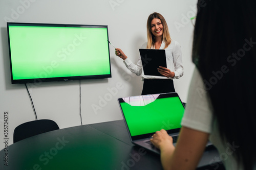 First Person View of Professional Freelancer Working on Green Mockup Screen Personal Computer
