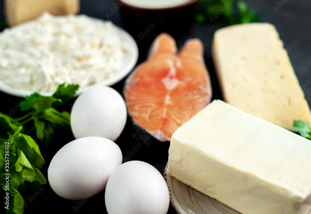 
Products containing vitamin D. Healthy food for teeth, bones, skin on a stone background