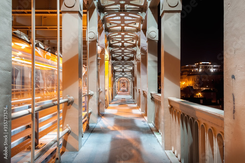 Evening Walk along High Level Bridge across River Tyne in Newcastle upon Tyne, UK photo