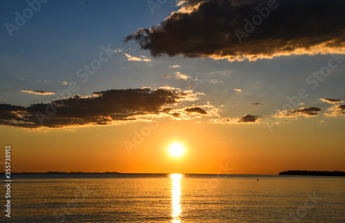 Beautiful sunset above the Adriatic Sea photographed from Zadar, Croatia © Vedrana