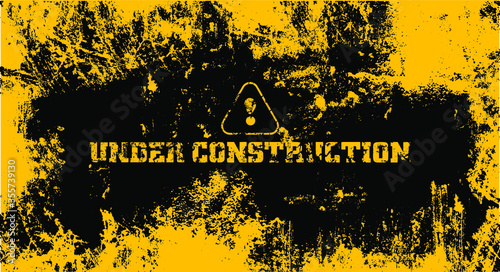under construction on warning sign.