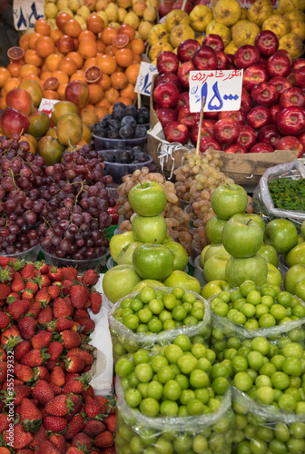 Fototapeta Naklejka Na Ścianę i Meble -  Varieties of Organic Spring Fruits in a Traditional Daily Market in Tehran
