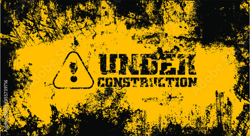 under construction on warning sign.