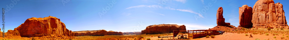 wide panorama of Monument Valley tribal park with view chimney rock