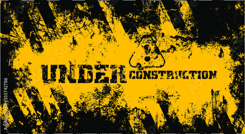 under construction on warning sign.