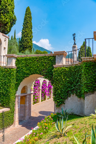 Path leading to Vittoriale degli italiani palace at Gardone Riviera in Italy photo