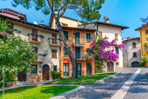 Fototapeta Naklejka Na Ścianę i Meble -  Narrow street in Gardone Riviera, Italy