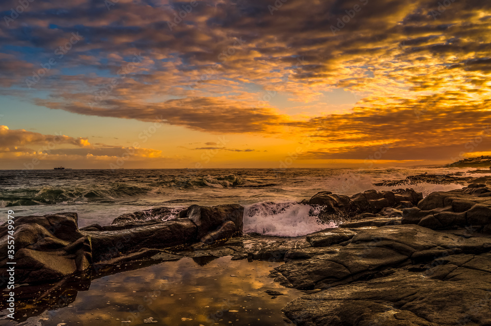 Naklejka premium Picturesque and rocky Ballito beach in north Durban , KZN South