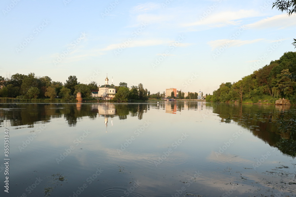 reflection of the church on the banks of the river