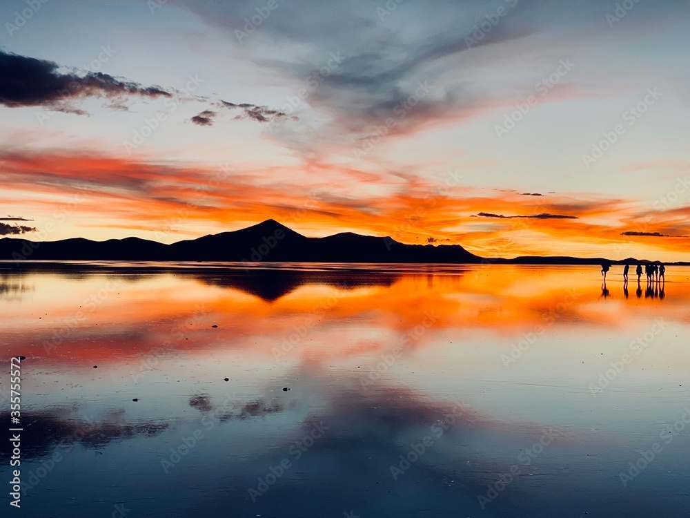 fantastic red sunrise over the lake in Uyuni Bolivia