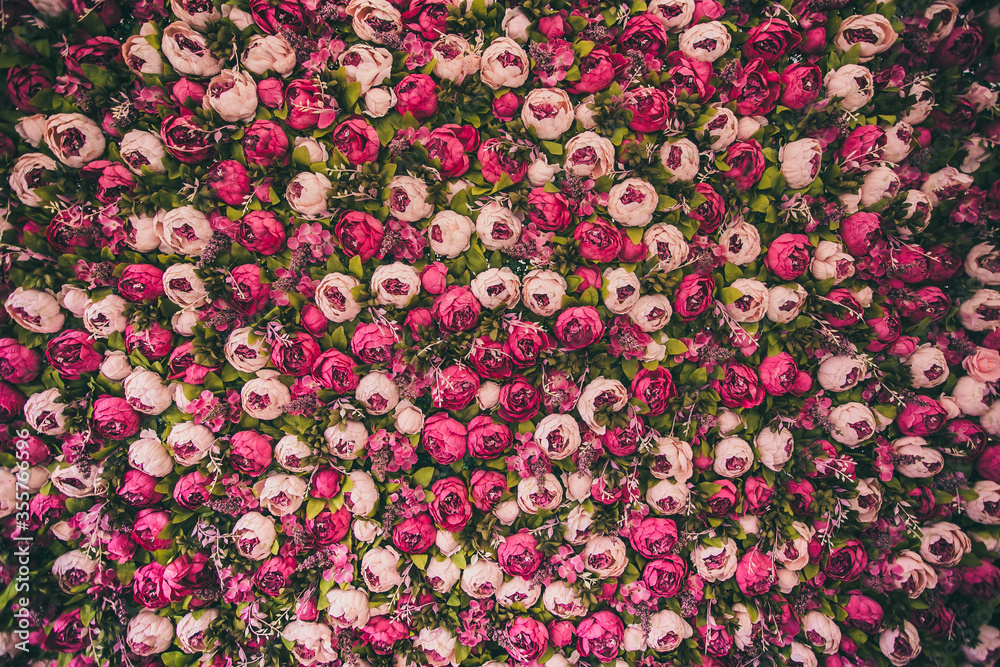 Wedding reception floral backdrop with pink peony flowers