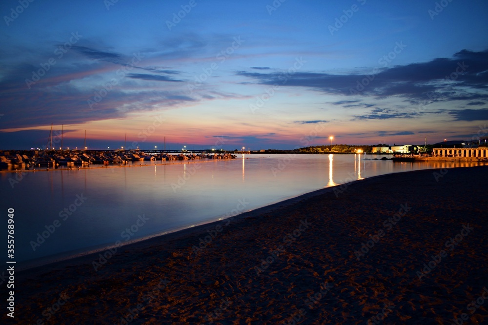 Fototapeta premium night seascape from the beach of Vada in Rosignano Marittimo in the province of Livorno, Tuscany Italy