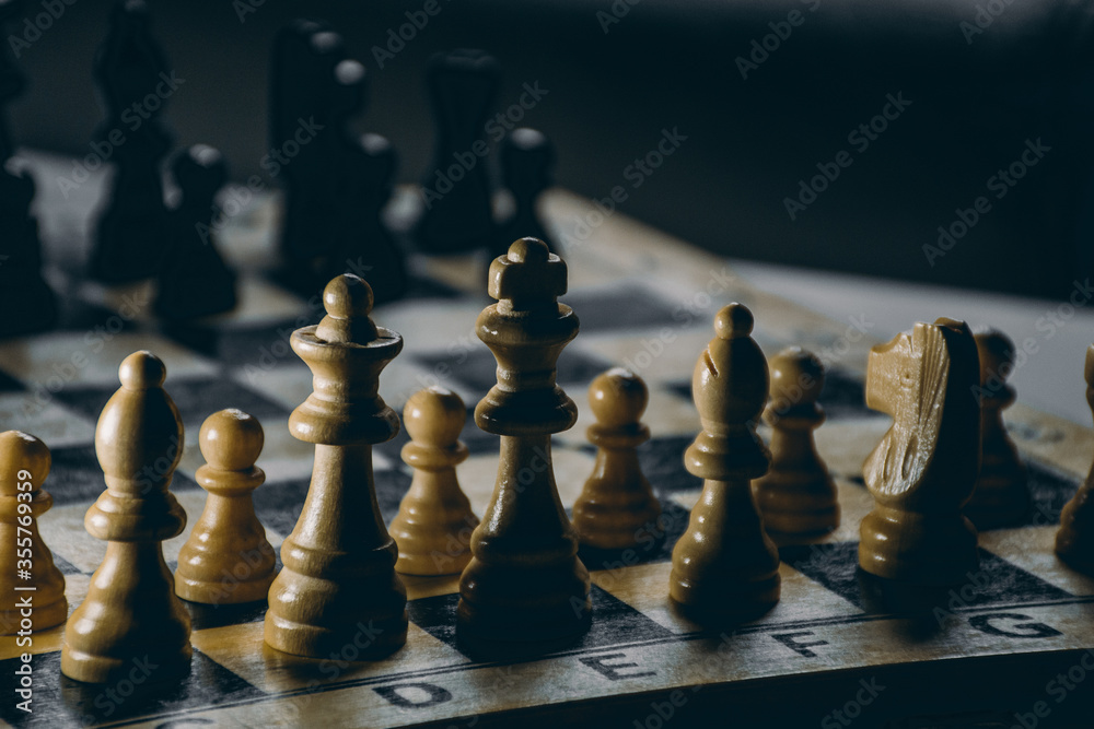 strategically playing chess with enemy player closeup figures strategically playing chess with enemy player closeup figures