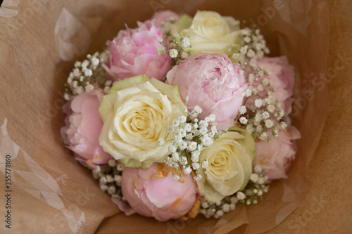 wedding bouquet with white roses and peony