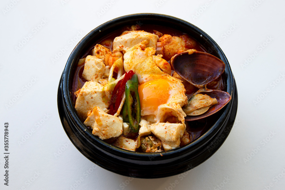 Korean spicy silken tofu stew with seafood Korean spicy silken tofu stew with seafood