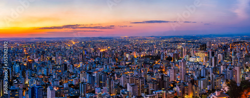 Panoramic Cityscape View During Colorful Sunset From Water Tank Lookout in Belo Horizonte, Minas Gerais State, Brazil photo