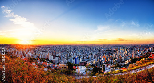 Panoramic Cityscape View During Colorful Sunset From Water Tank Lookout in Belo Horizonte, Minas Gerais State, Brazil photo