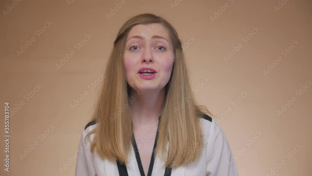 Singer with headphones front portrait girl with braces singing dancing swaying caucasian white 30 years Singer with headphones front portrait girl with braces singing dancing swaying caucasian white 30 years