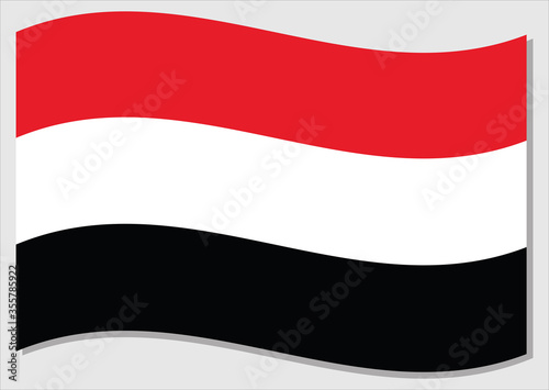 Waving flag of Yemen vector graphic. Waving Yemeni flag illustration. Yemen country flag wavin in the wind is a symbol of freedom and independence.