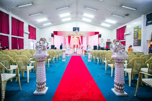 Indian Hindu wedding ceremony interiors, decorations and beautiful mandap photo