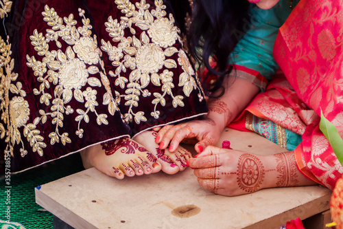 Indian Hindu bride's henna mehendi mehndi feet close up