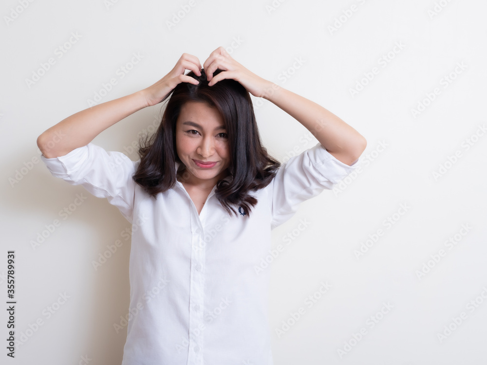 Portrait of young asian woman standing and smiling
