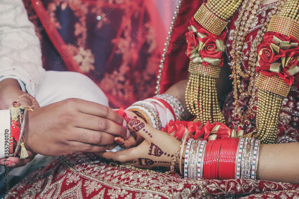 Indian Hindu wedding ceremony and pooja ritual items, hands, and decorations close ups