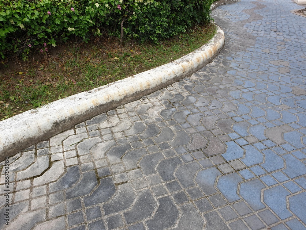 Paving stone on the street pattern brick surface.
