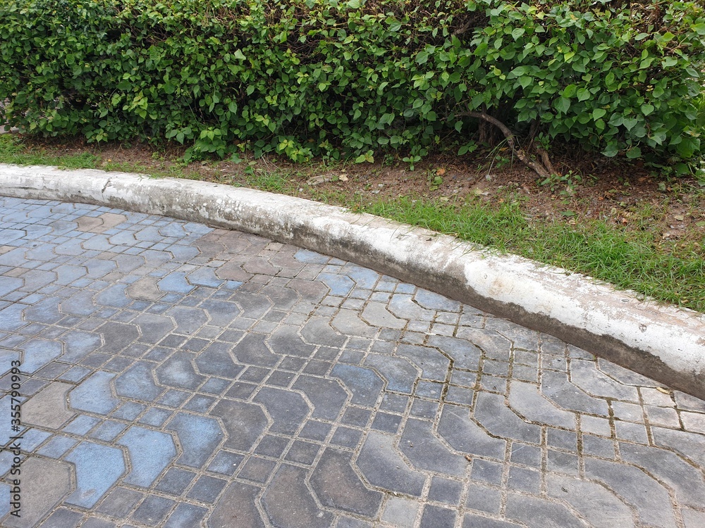 Paving stone on the street pattern brick surface.