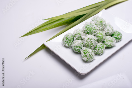 A set of traditional confectionery famous in Malaysia,Indonesia and Singapore,know as Buah Melaka or ondeh-ondeh ,isolated over white 