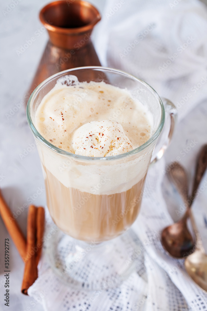 coffee with ice cream in a glass on a table, selective focus coffee with ice cream in a glass on a table, selective focus