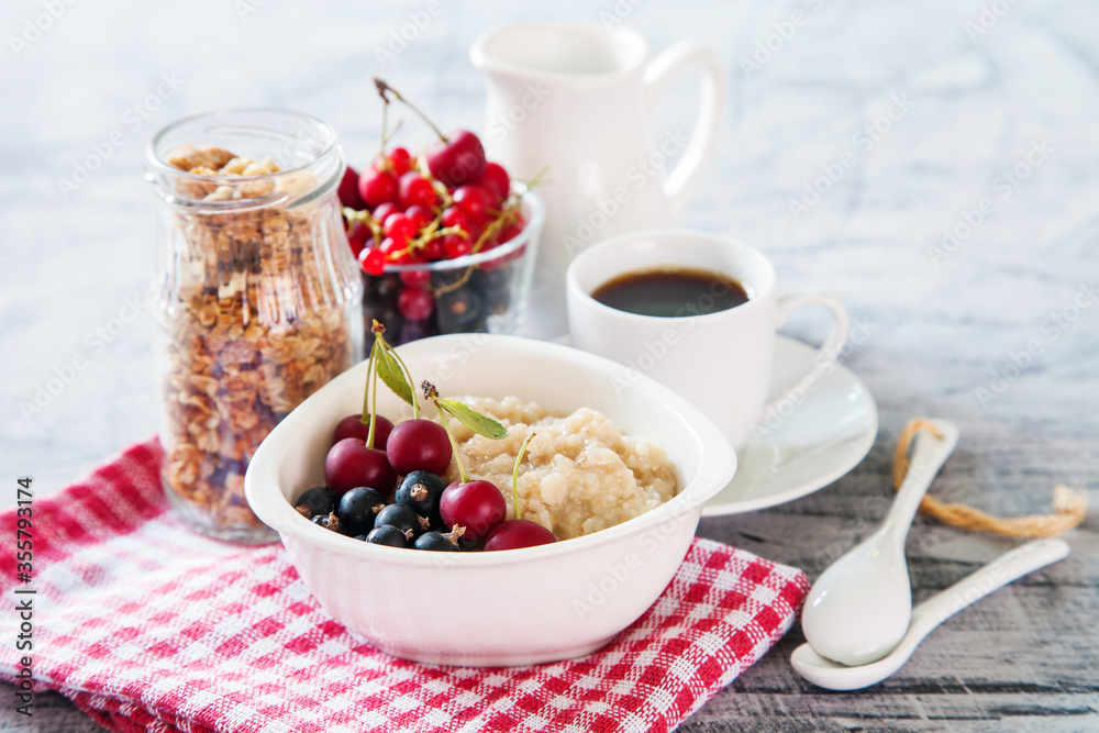 porridge with berries on a table, selective focus porridge with berries on a table, selective focus