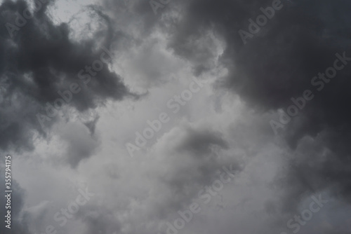 Dark clouds background. The sky is covered all over by clouds before rainfall.
