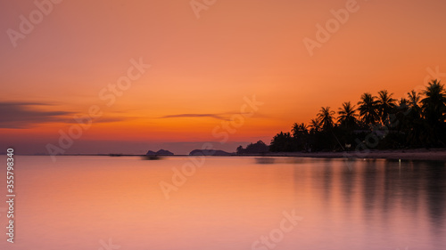 Colorful twilight in evening over seascape at Baan khai beach  Koh Phangan  Thailand. Long exposure photography.
