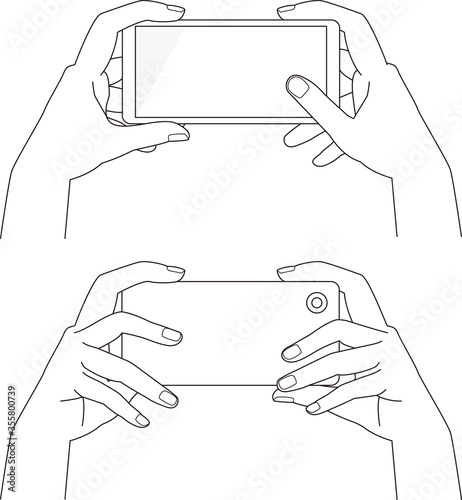 スマートフォンを持つ手