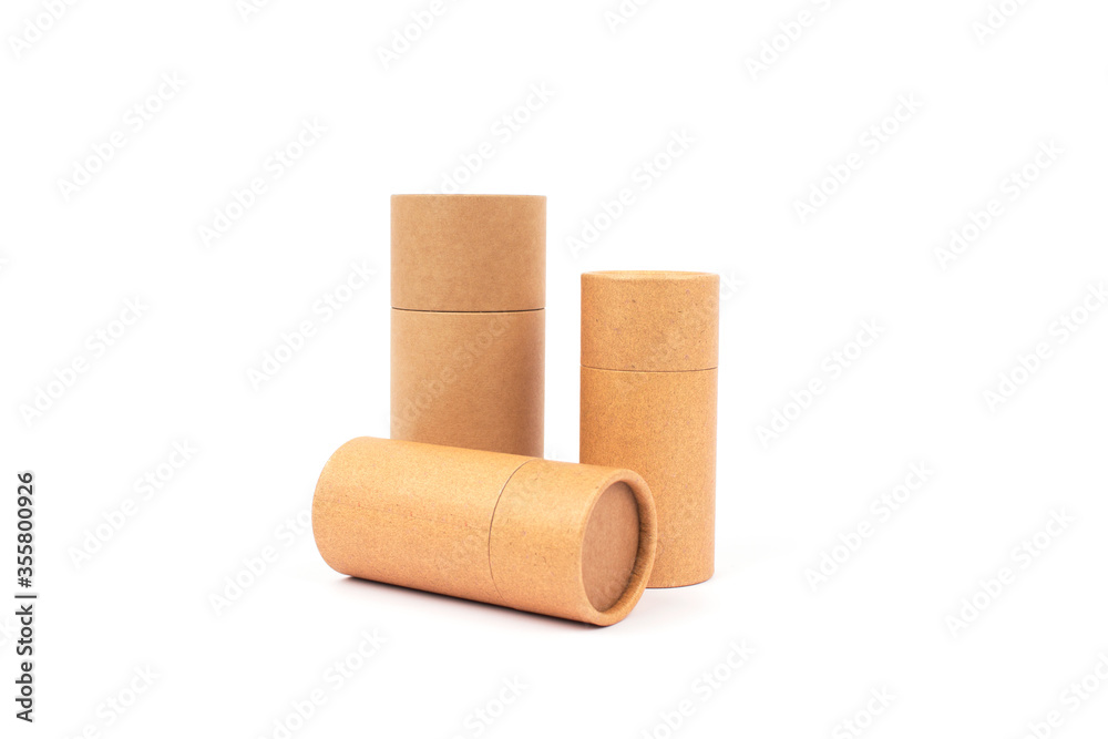 Brown paper tubes isolated on white. Recyclable and reusable ecological paper packaging concept. Mockup Brown paper tubes isolated on white. Recyclable and reusable ecological paper packaging concept. Mockup