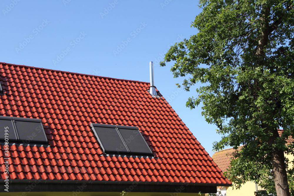 a house with new roof windows a house with new roof windows