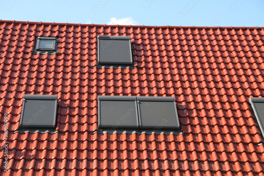 Fototapeta premium a house with new roof windows