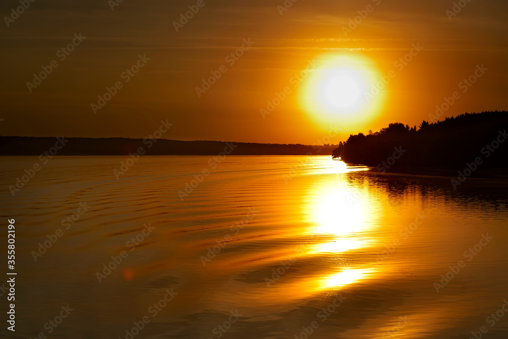 Sunset orange lake water reflection landscape. Reflection of sunset water. River sunset orange view. Sunset river water reflection
