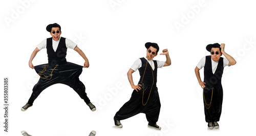 Funny young man dancing isolated on white