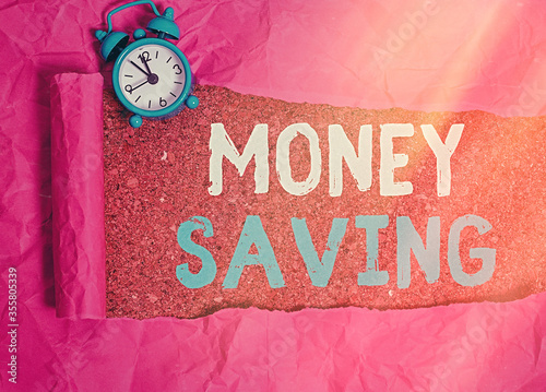 Conceptual hand writing showing Money Saving. Concept meaning investment and deposit in a bank and deferred purchases photo