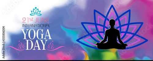 A man meditating on the yoga day. Colorful background with a symbol of a flower