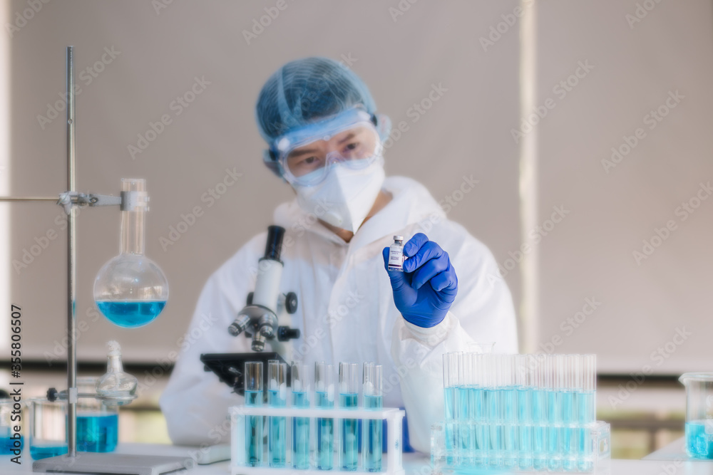 Scientist Working On Coronavirus Vaccine At Lab.
Abstract of Analyzing covid 19 sample with microscope and holding coronavirus covid 19 blood sample tube in laboratory. Scientist Working On Coronavirus Vaccine At Lab.
Abstract of Analyzing covid 19 sample with microscope and holding coronavirus covid 19 blood sample tube in laboratory.