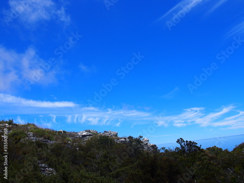 The beautiful blue sky seen from the cliffs of Table Mountain, Cape Town, South Africa