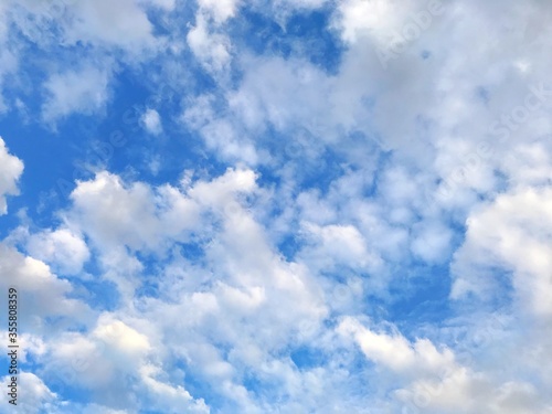 Dramatic blue sky and white clouds on sky bright and clear day background.