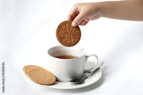 Fresh a cup of tea and some of sweet biscuit