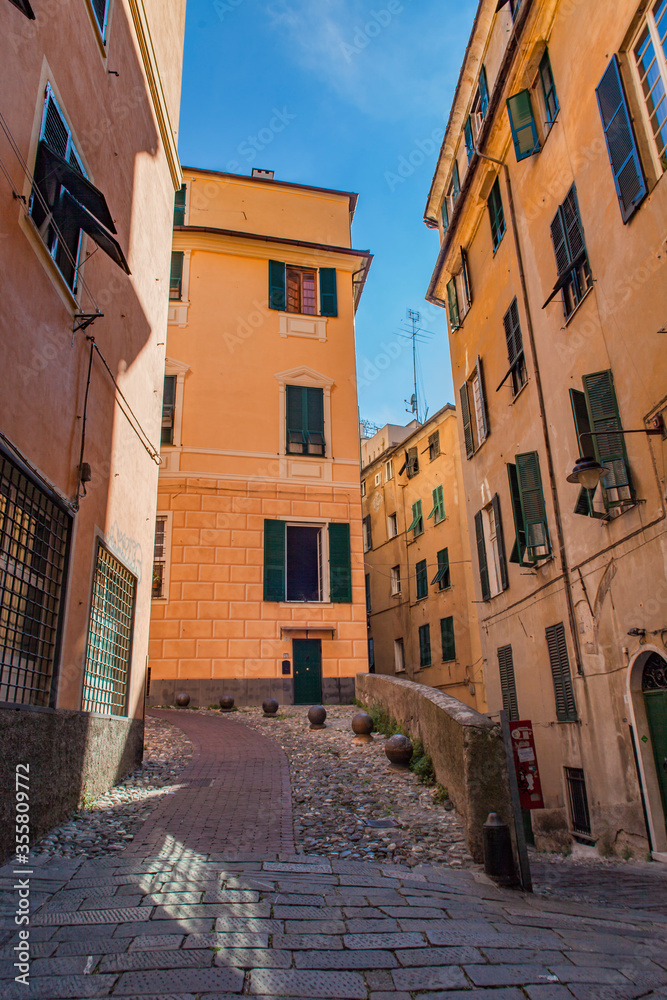 Narrow street in the historic center of Genoa, Italy