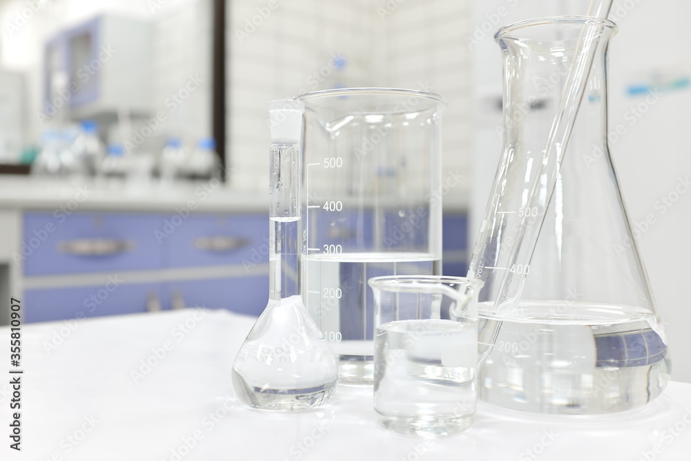 Chemistry Science laboratory flask, beaker and glassware with clear