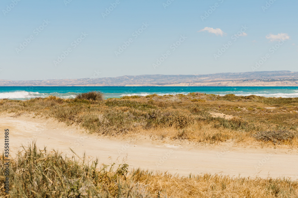 beautiful azure sea and pebble beach. High quality photo